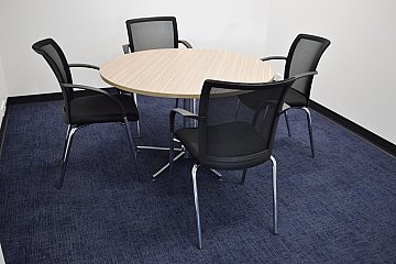 Bidvest, polished 5 star meeting table with Seasoned Oak top and 4 leg black Galaxy chairs