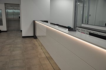 Hindmarsh Medical, Apex Gloss Counter with mirrored kicker & feature LED strip lighting