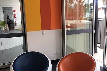 Ocean View College, custom Bobble chairs in blue & orange vinyl