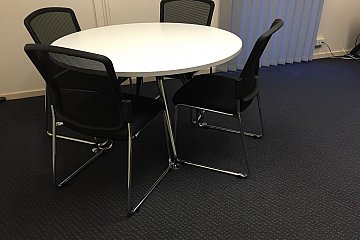 Augusta Park Primary, Eccosit Wing polished frame meeting table in Laminex Polar White with black Spencer chairs