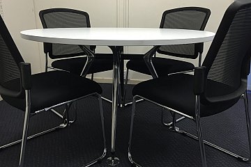 Augusta Park Primary, Eccosit Wing polished frame meeting table in Laminex Polar White with black Spencer chairs