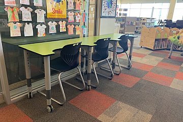 St. Martins Lutheran, Kinetic bench in Laminex Juicy with black Mata cantilever student chairs