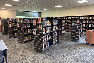 Grant High School, mobile straight library shelving with slat wall end in Laminex Battalion